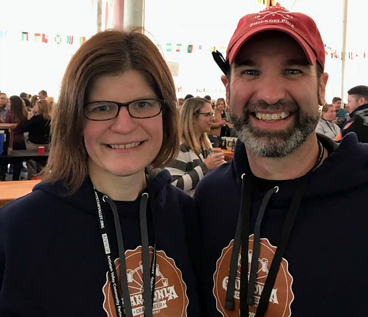 Rob & Jen posing at the Antietam Valley Community Partnership Carsonia Craft Beer & Wine Amusement
